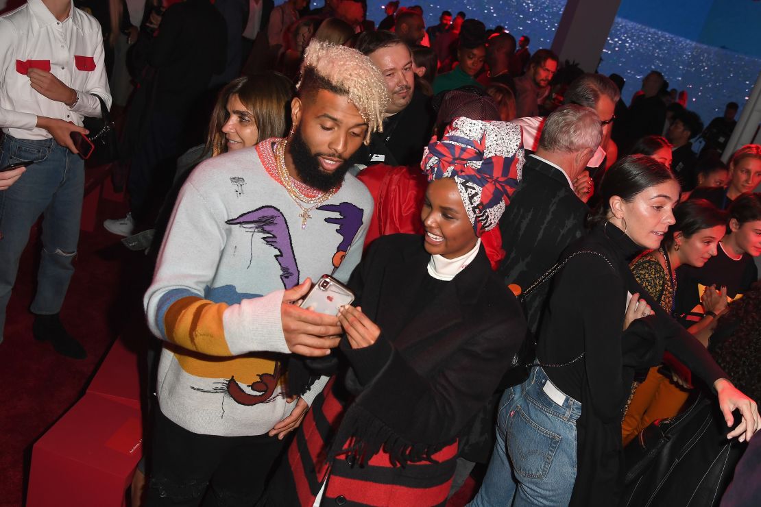 Odell Beckham, Jr. (here with model Halima Aden) attends the Calvin Klein Collection Spring-Summer 2019 show in September 2018.