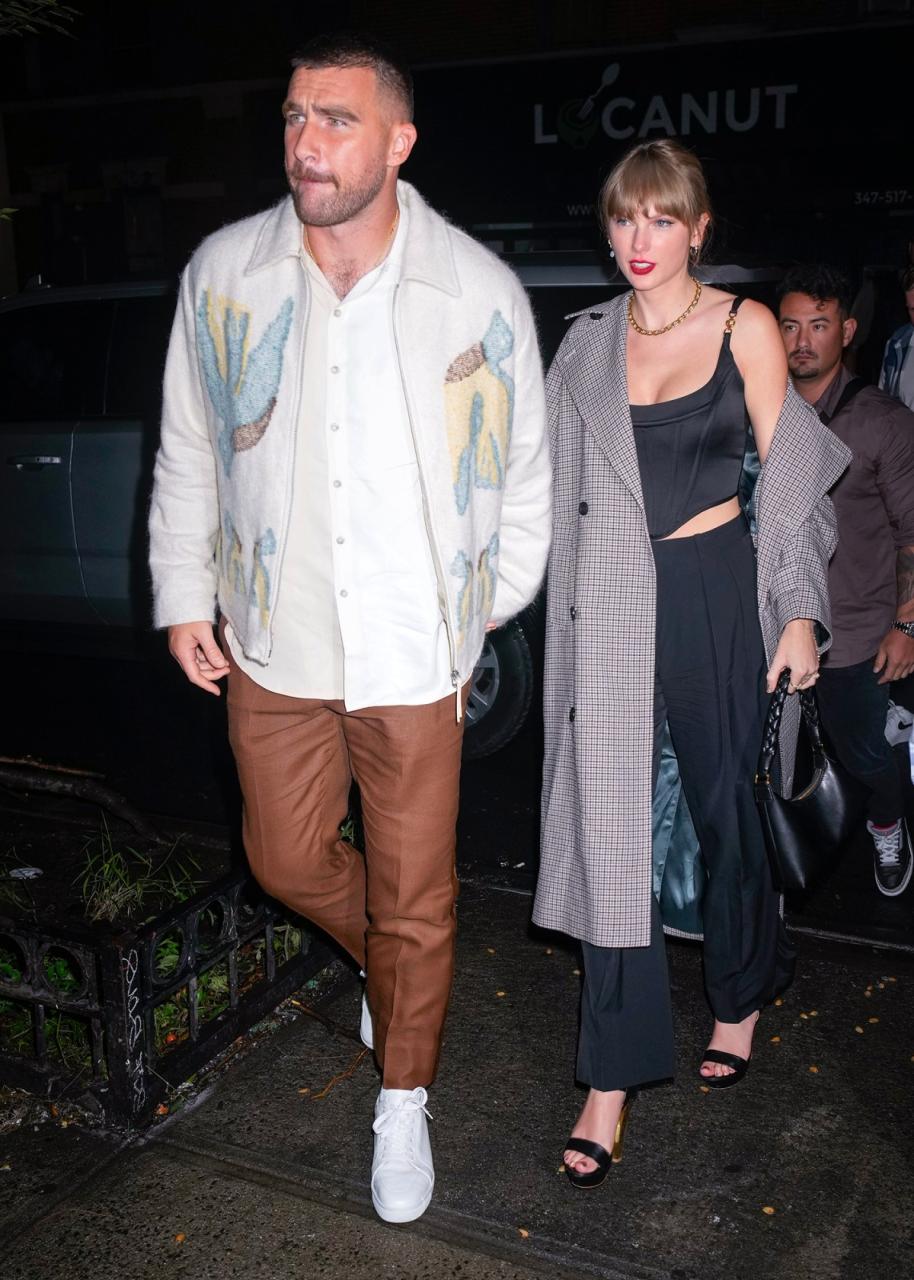 Taylor Swift and Travis Kelce Hold Hands After Surprise 'SNL' Cameos