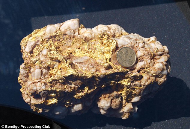 He's struck gold! Mysterious young father hits the jackpot after finding two giant nuggets worth almost 0,000