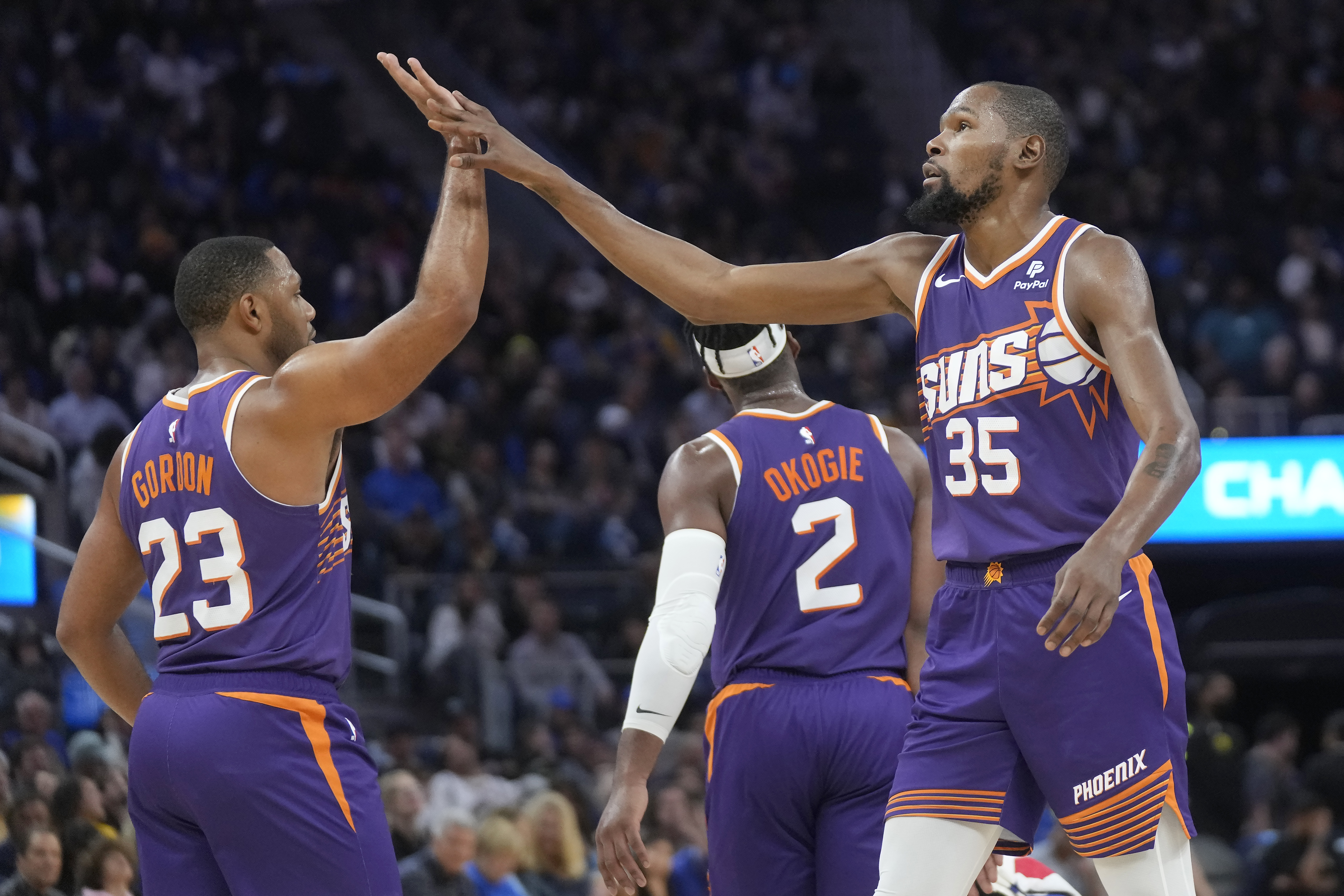 Booker, Durant lead Suns past Curry and Warriors 108-104 in season opener –  KXAN Austin