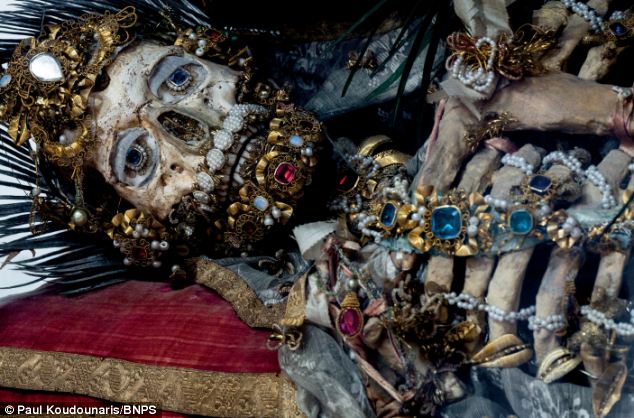 Incredible skeletal remains of 'Catholic saints' that are still dripping in gems and jewellery and have now been dug up by 'Indiana Bones' explorer | Daily Mail Online