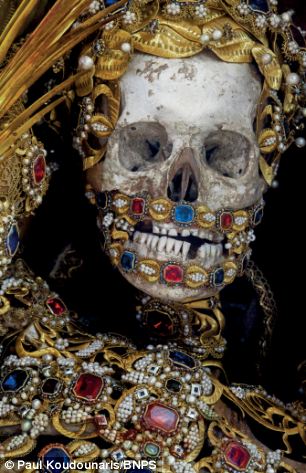 Incredible skeletal remains of 'Catholic saints' that are still dripping in gems and jewellery and have now been dug up by 'Indiana Bones' explorer | Daily Mail Online