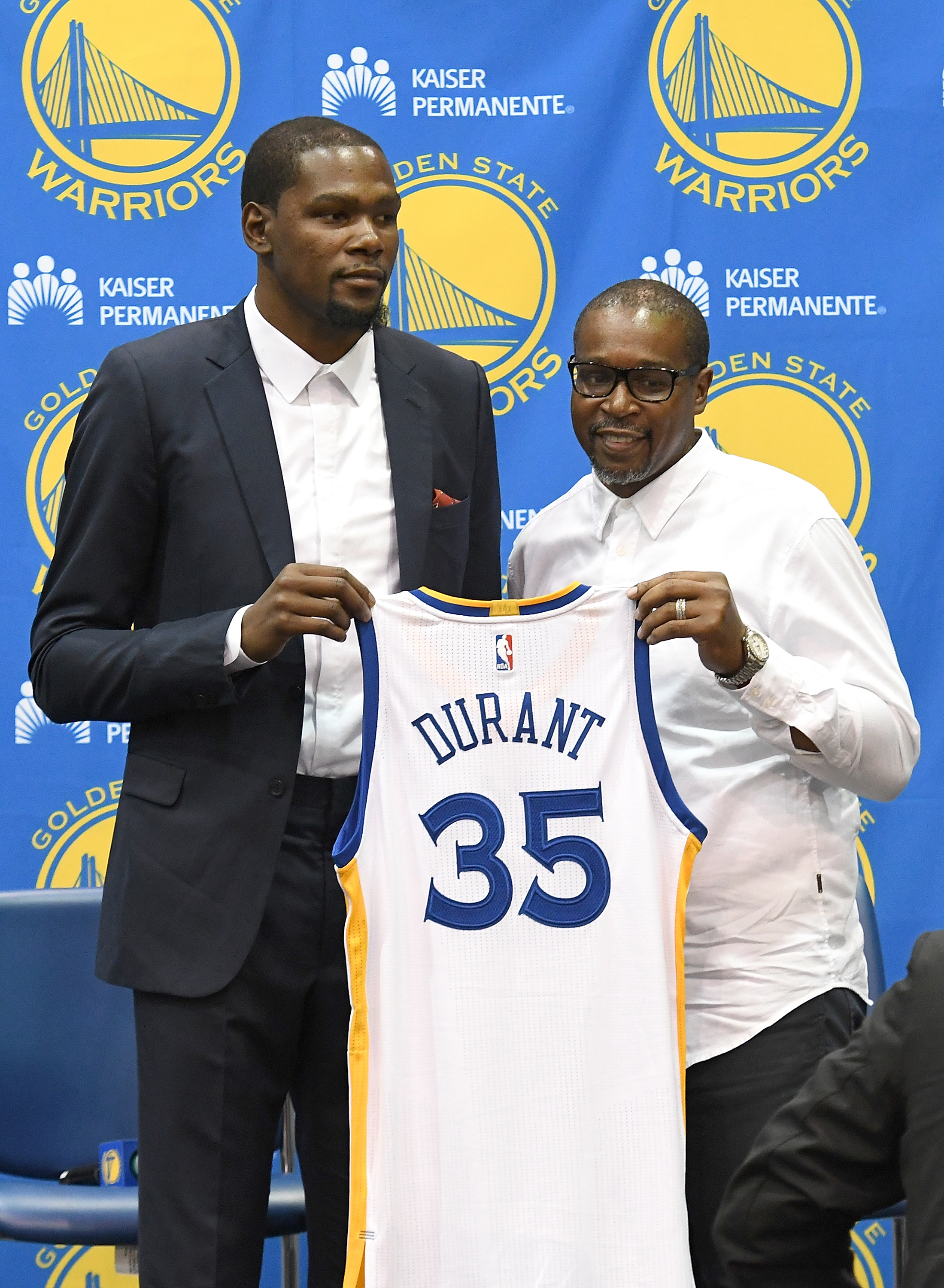 OAKLAND, CA - JULY 07: Kevin Durant #35 of the Golden State Warriors stands with his father Wayne Pratt during the press conference where Durant was introduced as a member of the Golden State Warriors.