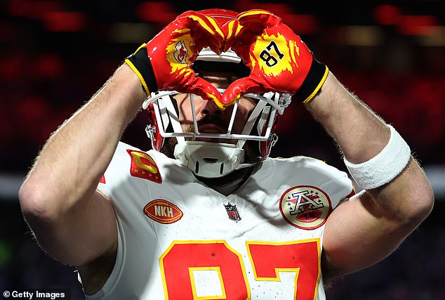 Kelce made a heart-gesture to the stands, with girlfriend Swift cheering him on