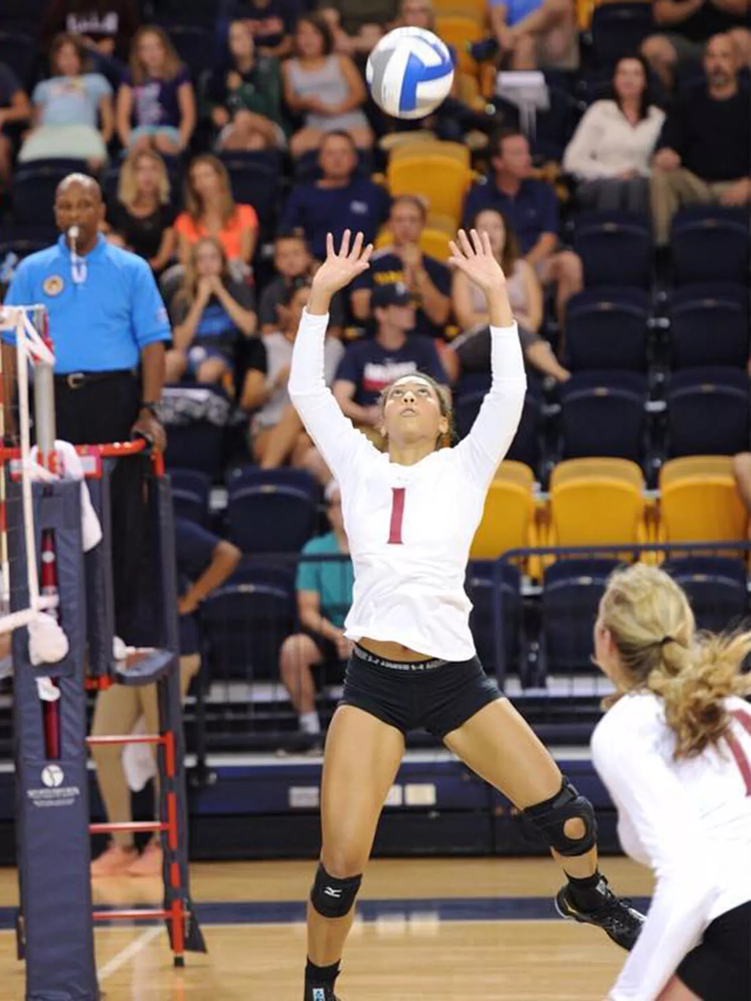 Sydel Curry playing volleyball at Elon University