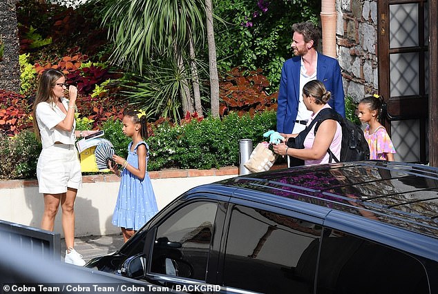 Prieto, who married Jordan in 2013, is pictured with their twin daughters Ysabel and Victoria